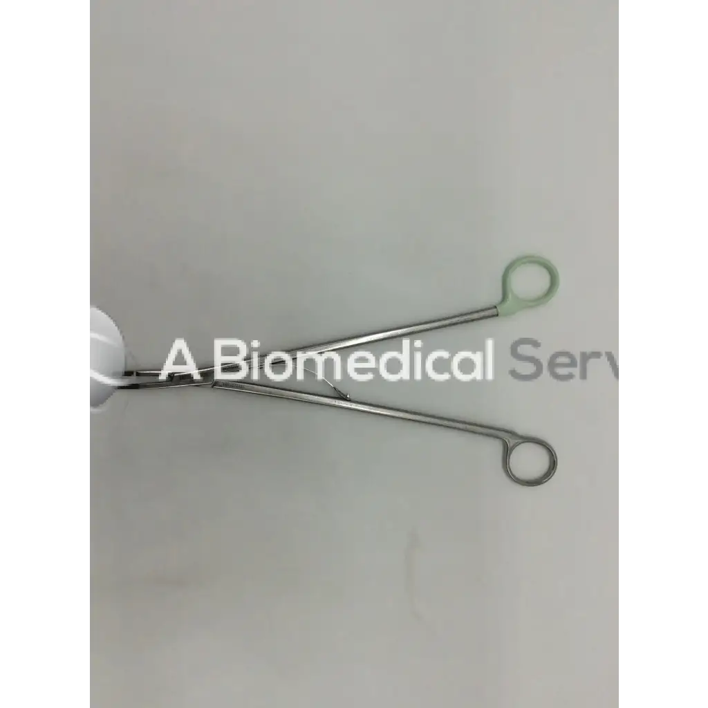 Silver surgical open ligating clip appliers medium with green plastic handles for precise clip application