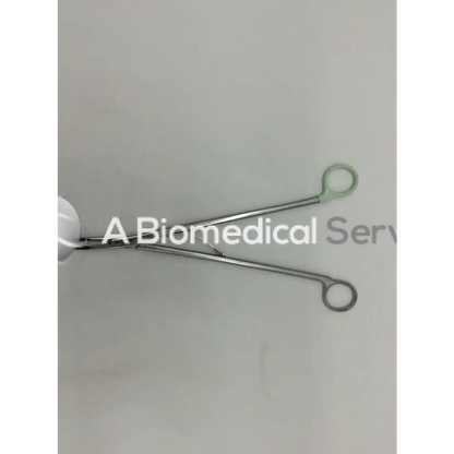 Silver surgical open ligating clip appliers medium with green plastic handles for precise clip application