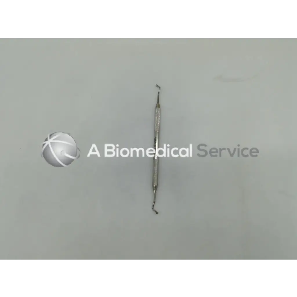 Silver hu-friedy burnisher 21b bb21b6 with textured handle and two curved opposing tips for dental use