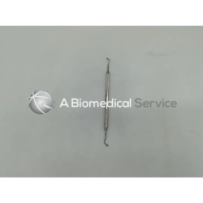 Silver hu-friedy burnisher 21b bb21b6 with textured handle and two curved opposing tips for dental use