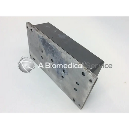 Rectangular metallic plate with dark gray worn surface and holes for mounting the inmotion 307340-000 pump speed controller