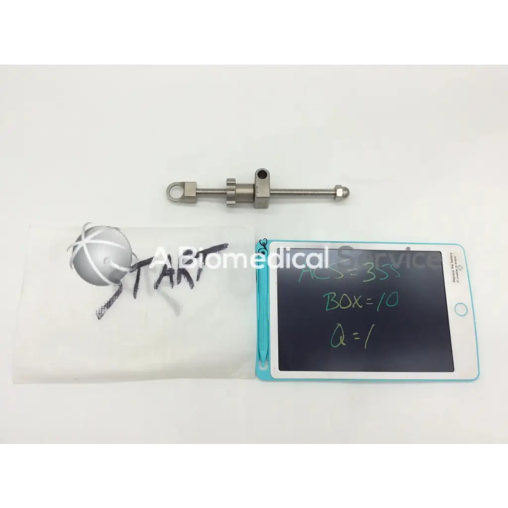 Silver metallic surgical screwdriver with threaded shaft and adjustable head from innomed t1015 kolbel glenoid retractors