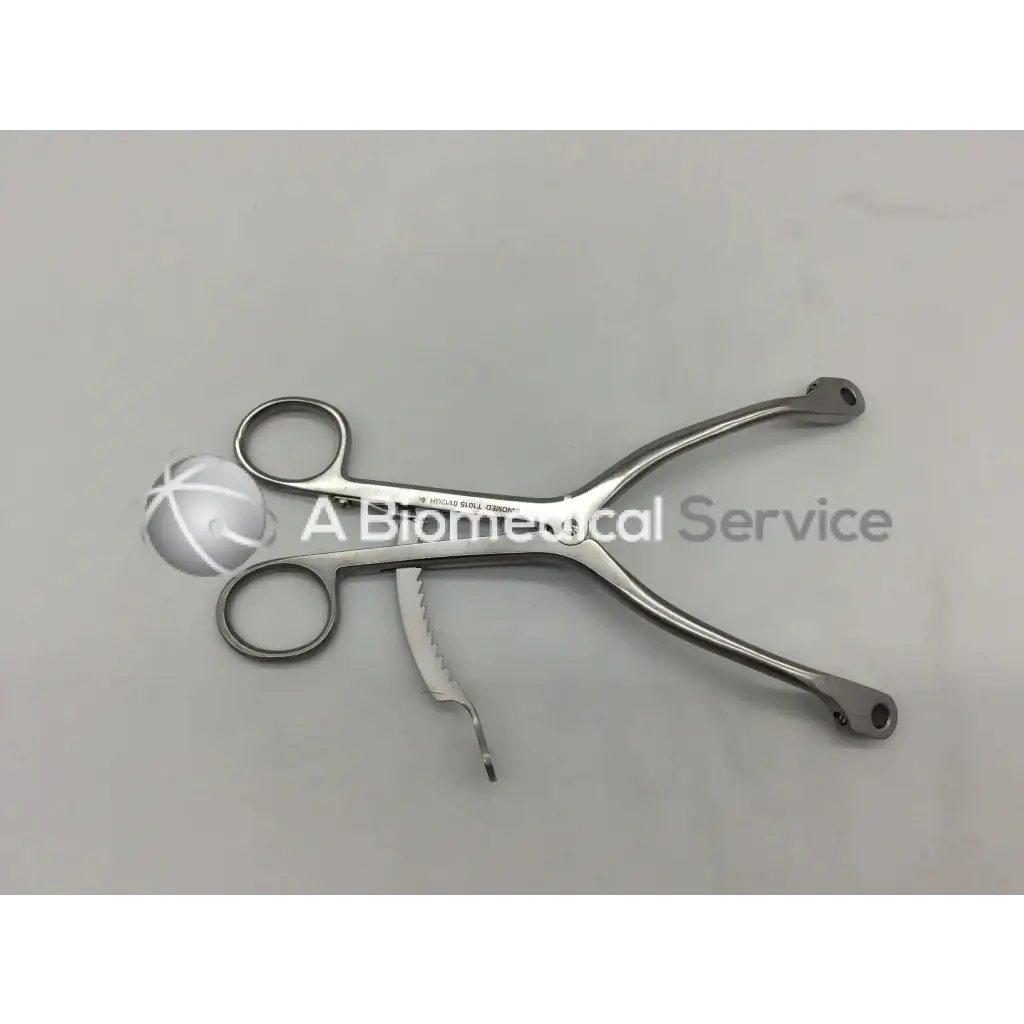Innomed t1015 kolbel stainless steel surgical clamp with serrated cutting edge and two circular handles