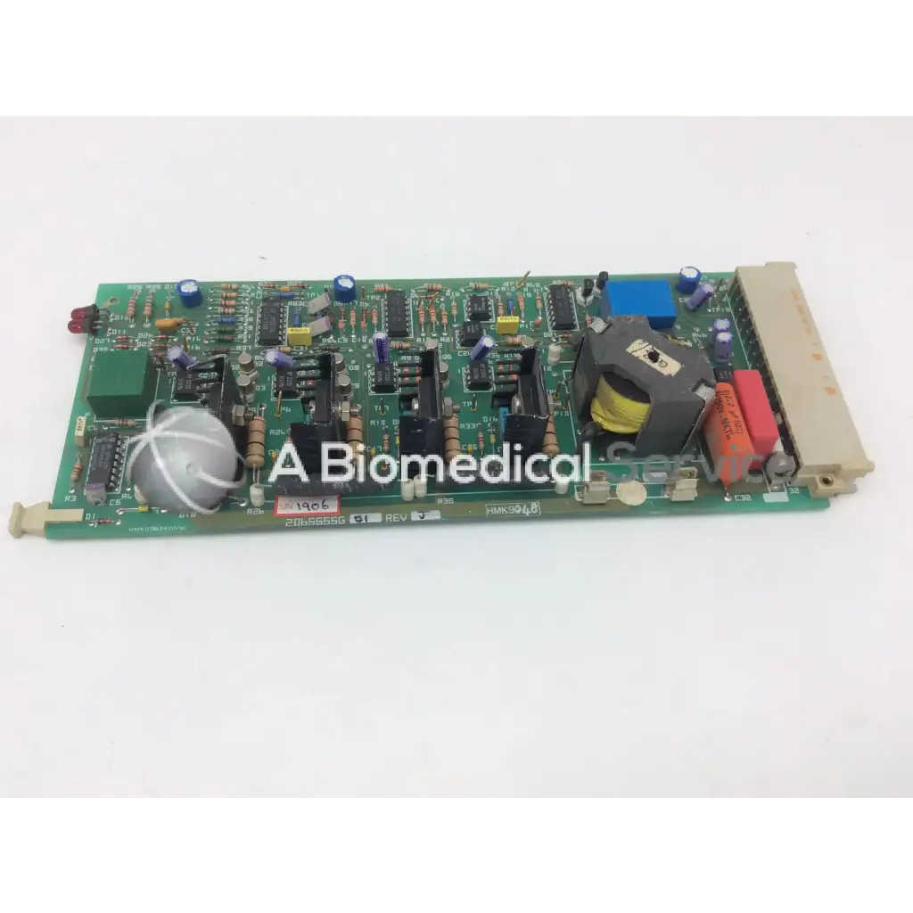 Green printed circuit board with capacitors resistors and integrated circuits instem 2065555g rev j hmk9048 board