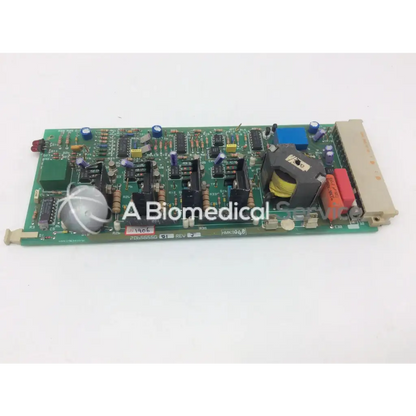 Green printed circuit board with capacitors resistors and integrated circuits instem 2065555g rev j hmk9048 board