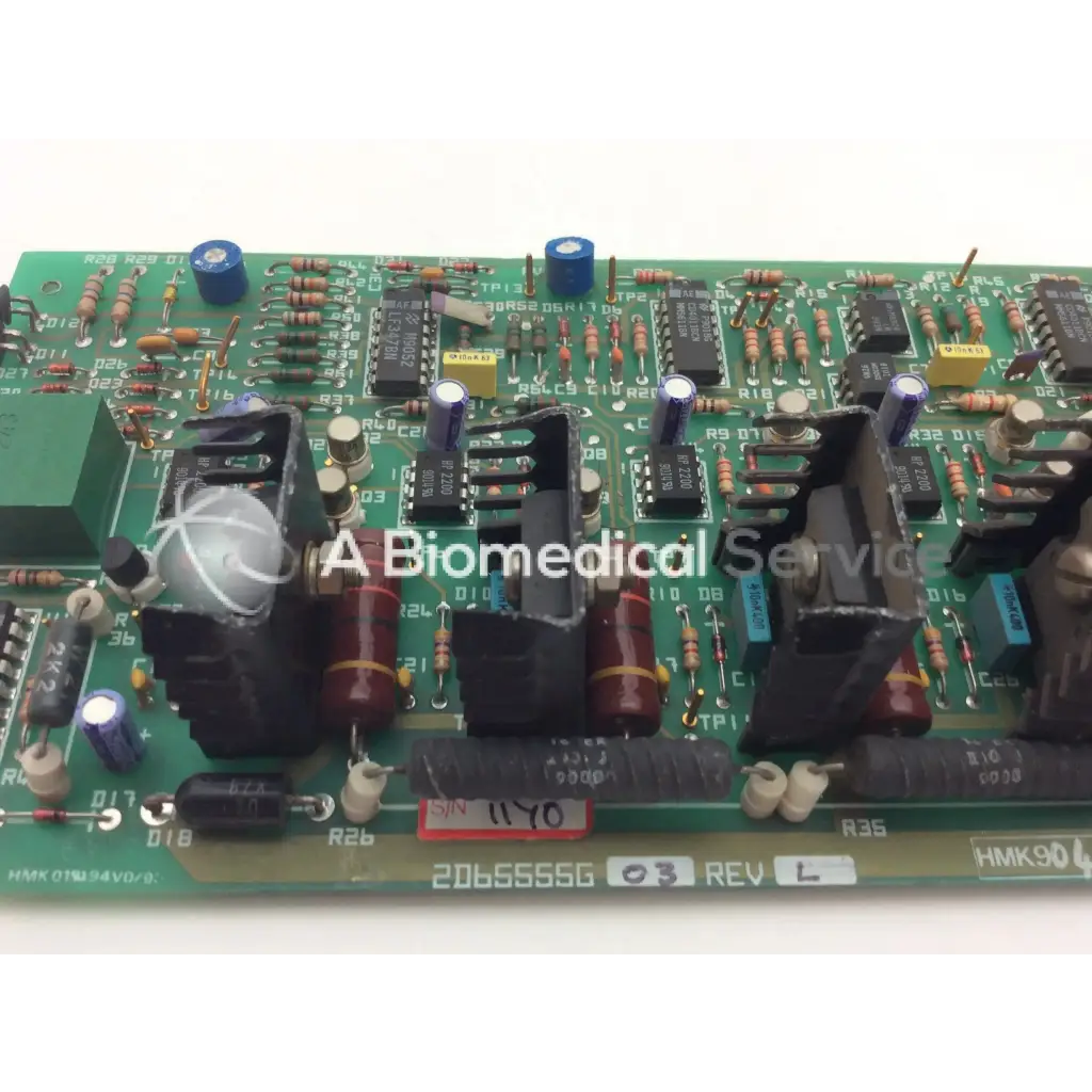 Green printed circuit board instem 2065555g rev l hmk9048 board with capacitors resistors and integrated circuits