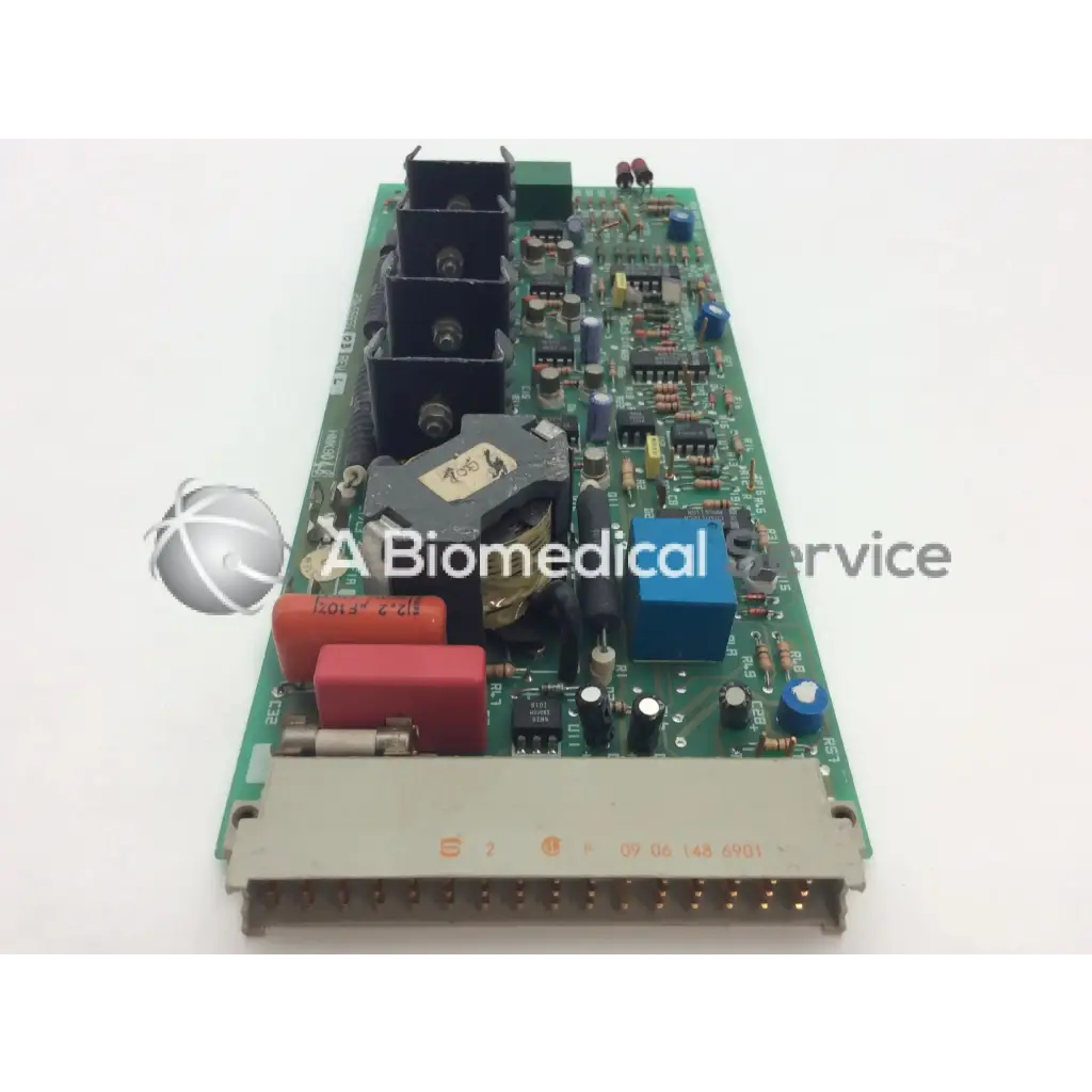 Green printed circuit board with black red and blue components for instem 2065555g rev l hmk9048 board