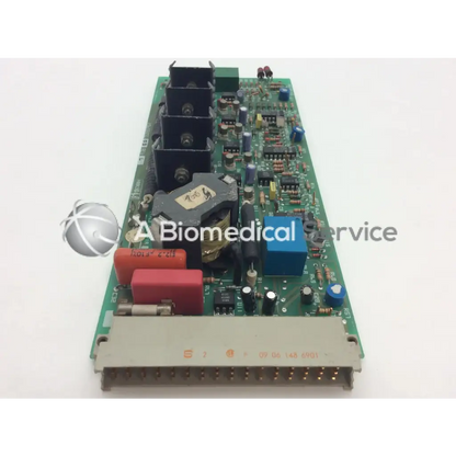 Green printed circuit board with black red and blue components for instem 2065555g rev l hmk9048 board