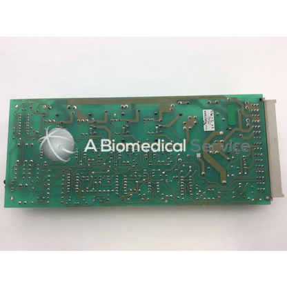 Green rectangular instem 2065555g rev l hmk9048 board with silver solder points and white logo on circuit board