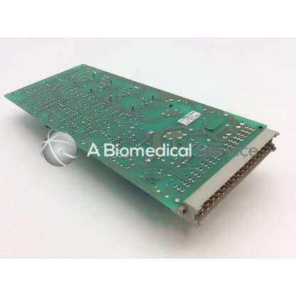 Green printed circuit board with silver soldered components and beige connector edge instem 2065555g rev l hmk9048 board