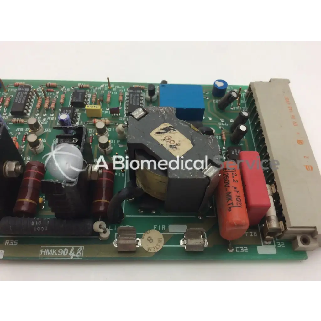 Green printed circuit board instem 2065555g rev l hmk9048 board with capacitors resistors and integrated circuits