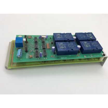 Green printed circuit board with four blue relays and components instem c21401811 rev c cew9023 c214020 rev d board