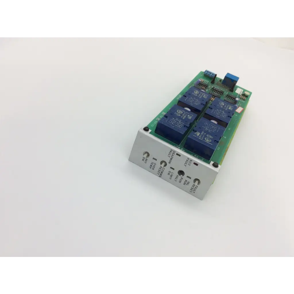 Green circuit board instem c21401811 rev with four blue relay modules and labeled screw terminals on silver metal panel