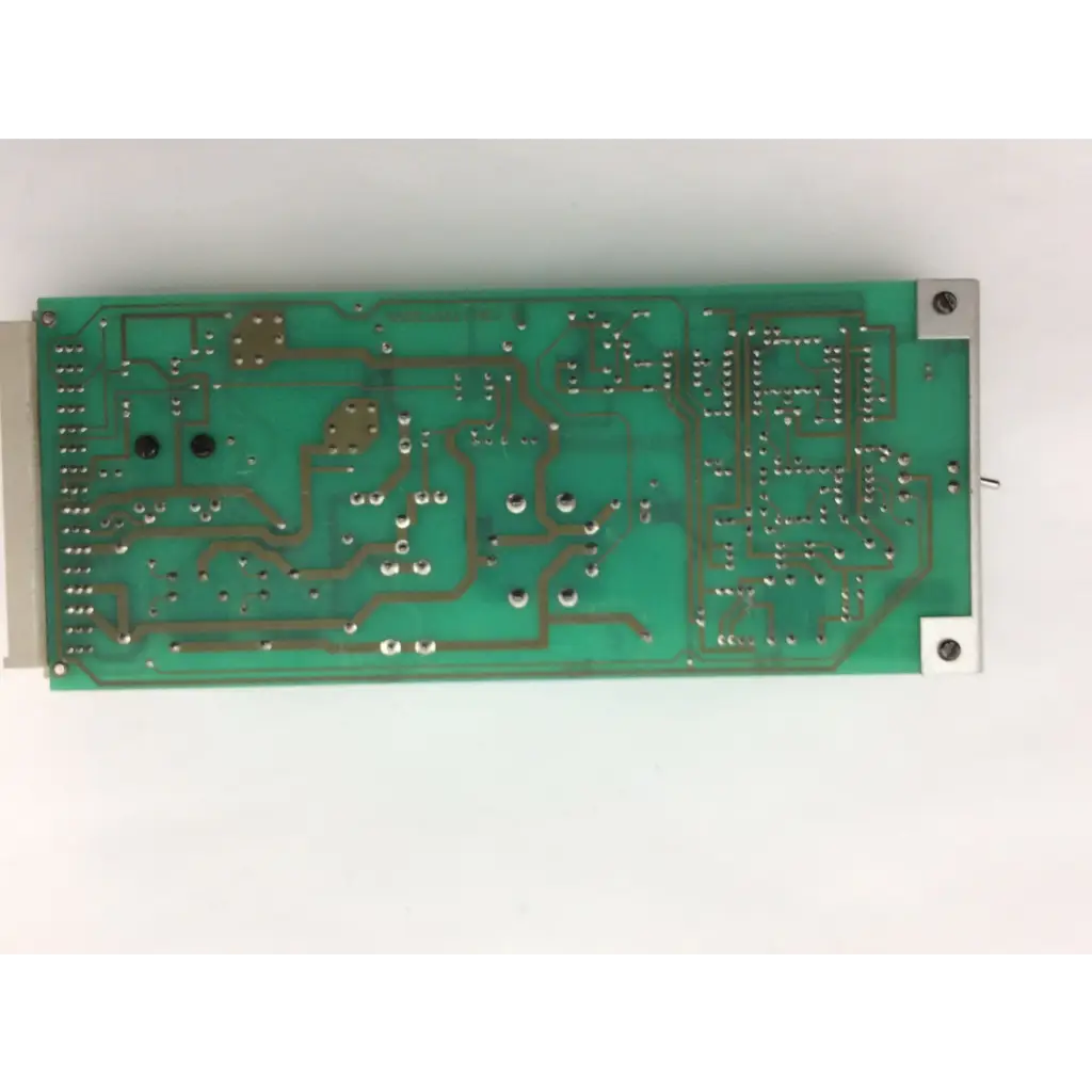 Green rectangular instem hmk9105 rev b control board with silver soldered components and 7222c65001 rev metallic connectors