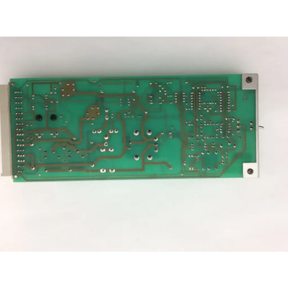 Green rectangular instem hmk9105 rev b control board with silver soldered components and 7222c65001 rev metallic connectors