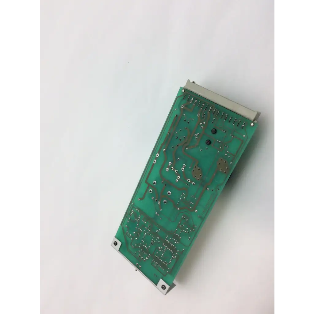 Green rectangular instem hmk9105 rev b control circuit board with silver edges and soldered components 7222c65001 rev