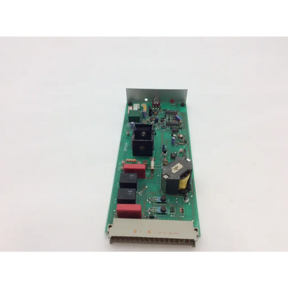 Green printed circuit board with black and red components instem hmk9105 rev b control 7222c65001 rev mounting bracket