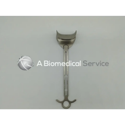 A sleek metallic integra jarit balfour center blade surgical speculum with curved upper blade and integrated ring handle