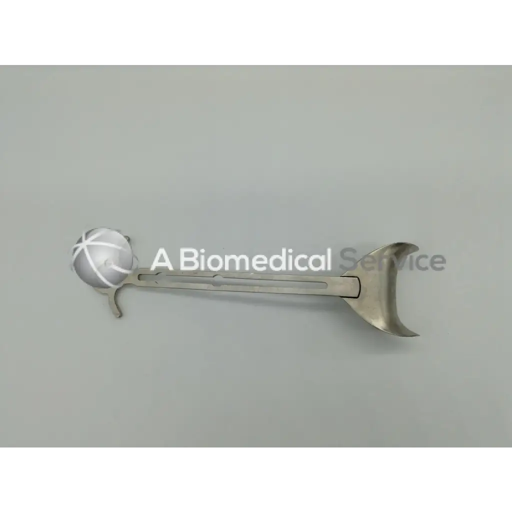 Silver integra jarit balfour center blade with spherical cross-hatched head and curved crescent-shaped handle