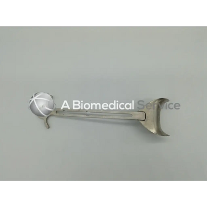 Silver integra jarit balfour center blade with spherical cross-hatched head and curved crescent-shaped handle