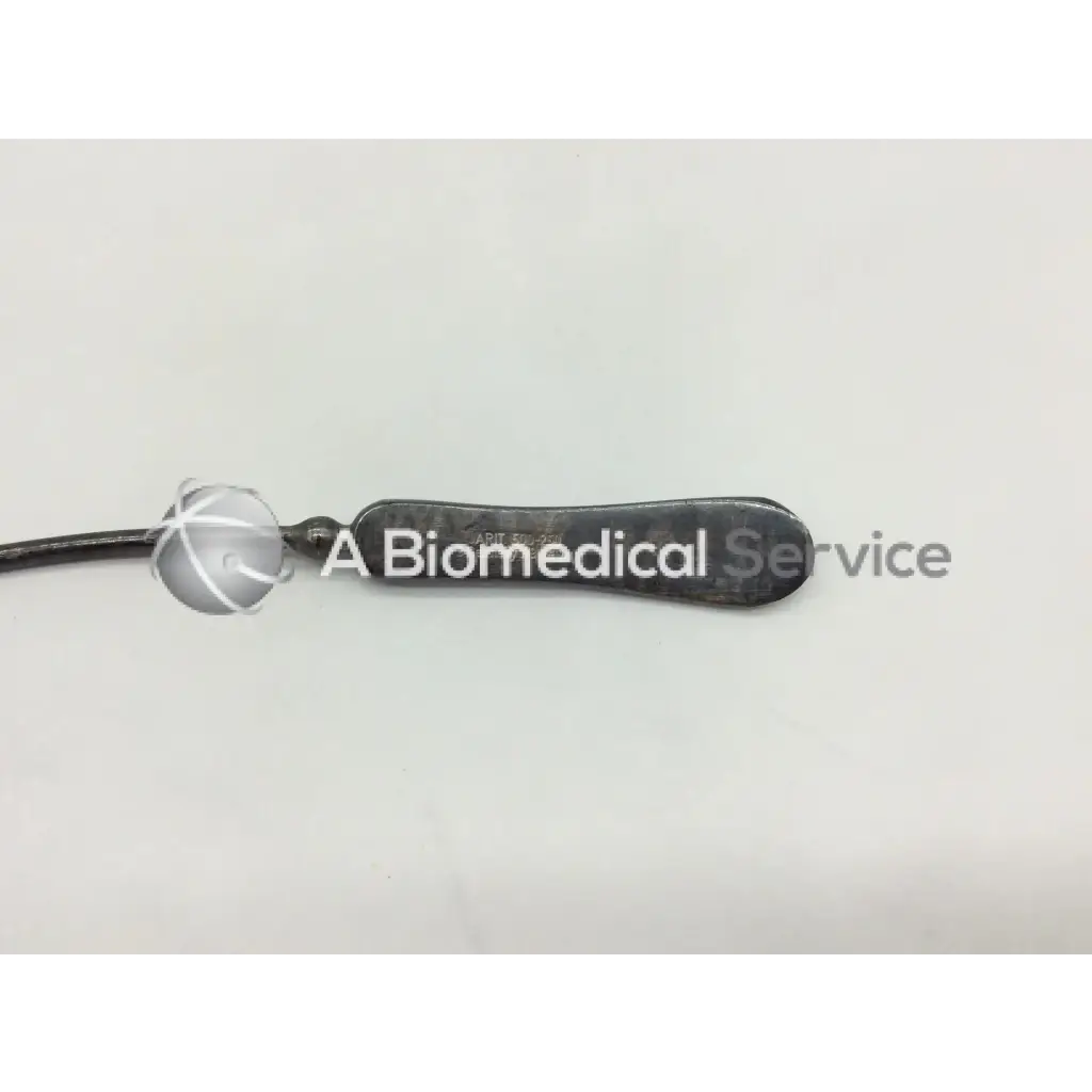 Integra jarit black metal uterine sound ac5-276 with rounded handle attached to black cord for medical use