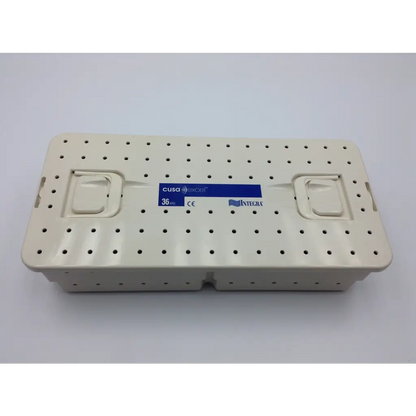 Cream-colored plastic sterilization case tray with blue cusa excel label for ultrasonic aspirator 36khz integra valleylab