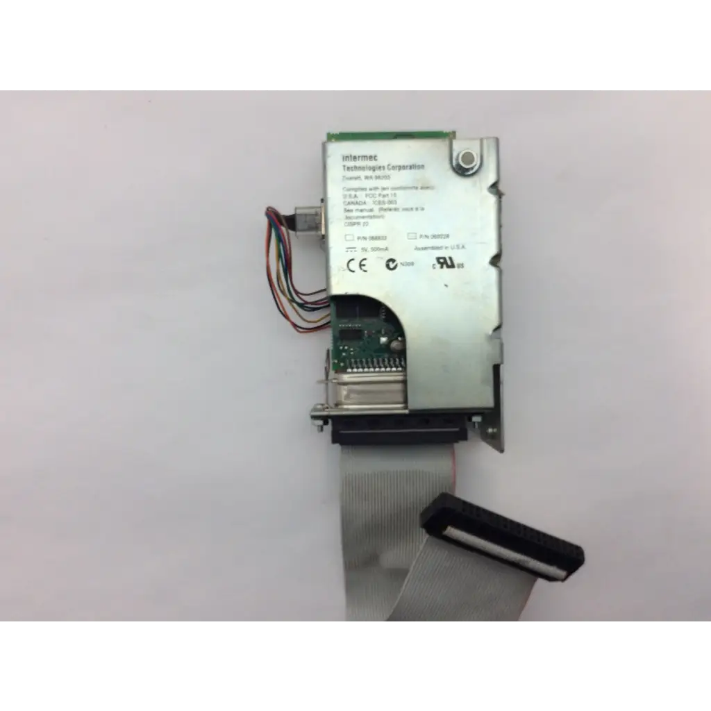 Silver metallic intermec 068832-001 3400e thermal label printer ethernet interface board with green circuit board and ribbon cable