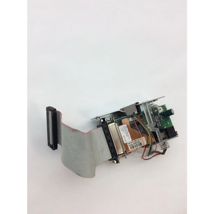 Gray flexible ribbon cable with black connector attached to intermec 068832-001 3400e thermal label printer ethernet board