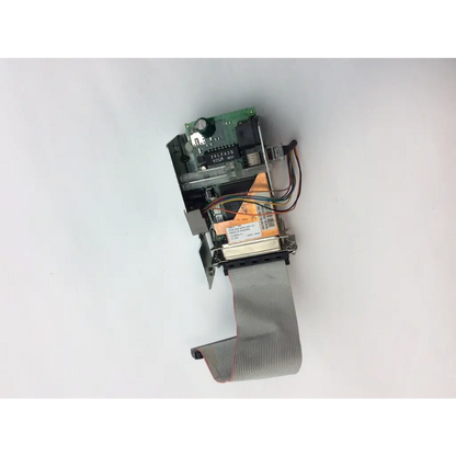 Gray ribbon cable extends from a green intermec 068832-001 3400e thermal label printer ethernet interface board