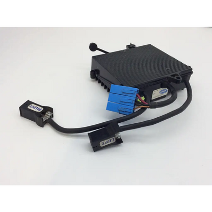 Black rectangular invacare 1105707 control module with ribbed heat sink and blue connectors for power wheelchair use