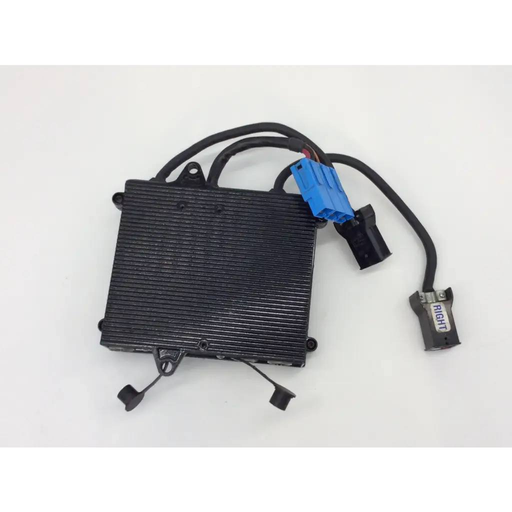 Black rectangular control module with ribbed surface and blue connector wiring harness for power wheelchair invacare 1105707
