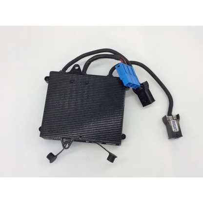 Black rectangular control module with ribbed surface and blue connector wiring harness for power wheelchair invacare 1105707