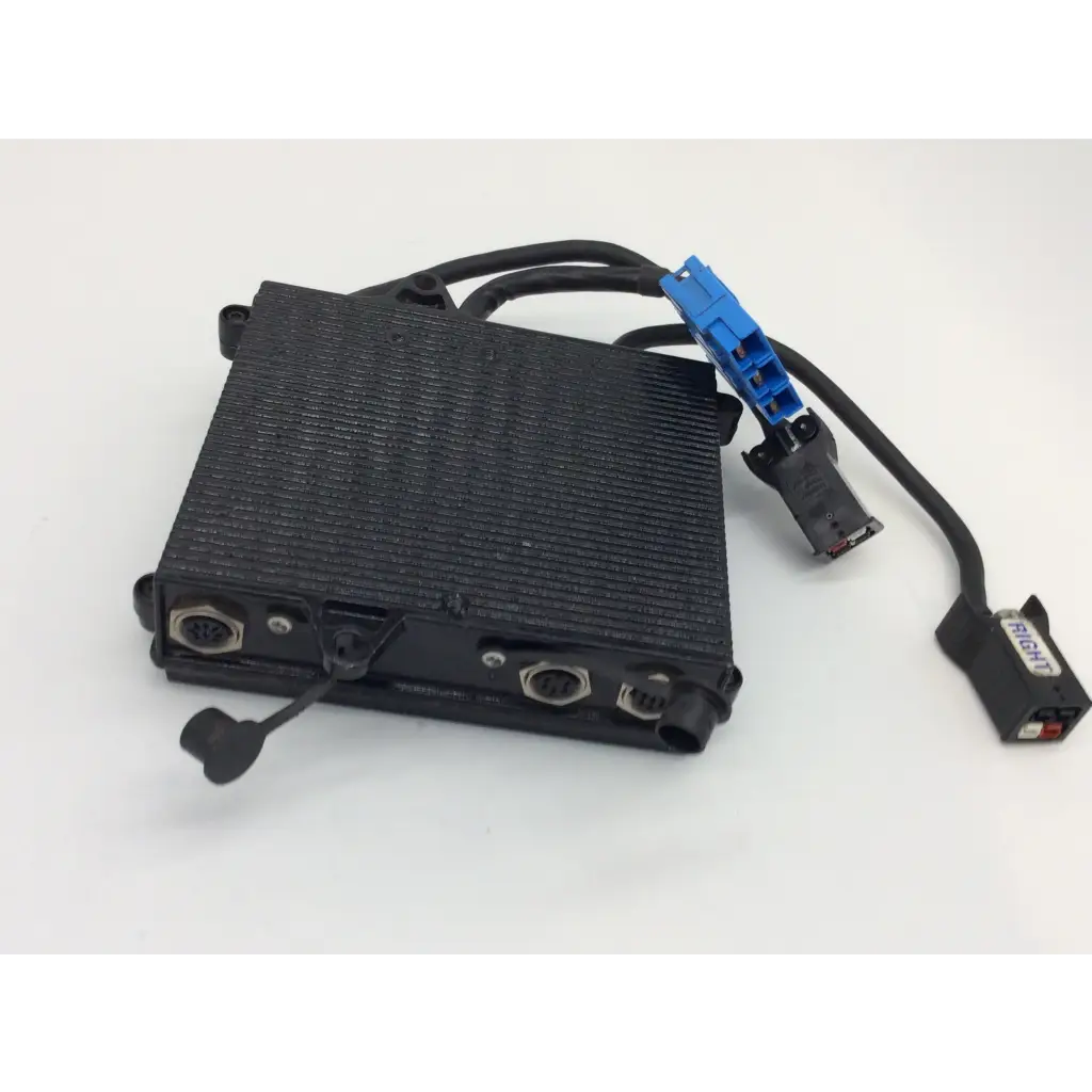 Black rectangular textured invacare 1105707 control module with multiple connectors for power wheelchair use