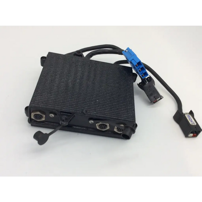 Black rectangular textured invacare 1105707 control module with multiple connectors for power wheelchair use