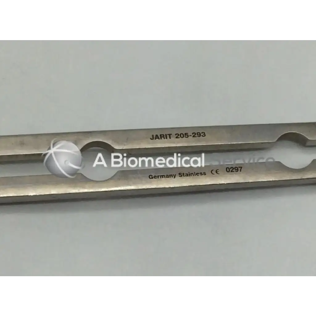Silver stainless steel balfour center blade surgical instrument with engraved markings and two circular cutouts