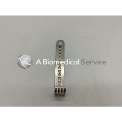 Stainless steel jarit 225-503 initial incision retractor with multiple circular holes and curved end for orthopedic use