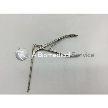 Silver mckenty rotatable punch with a curved articulated design and long handle 90 degree angle stainless surgical tool
