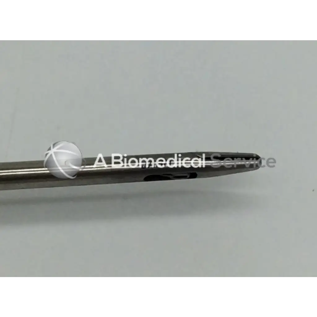 Jarit 600-261 laparoscopic in-line needle holder with silver surgical needle and white cross-hatched spherical tip carb-bite