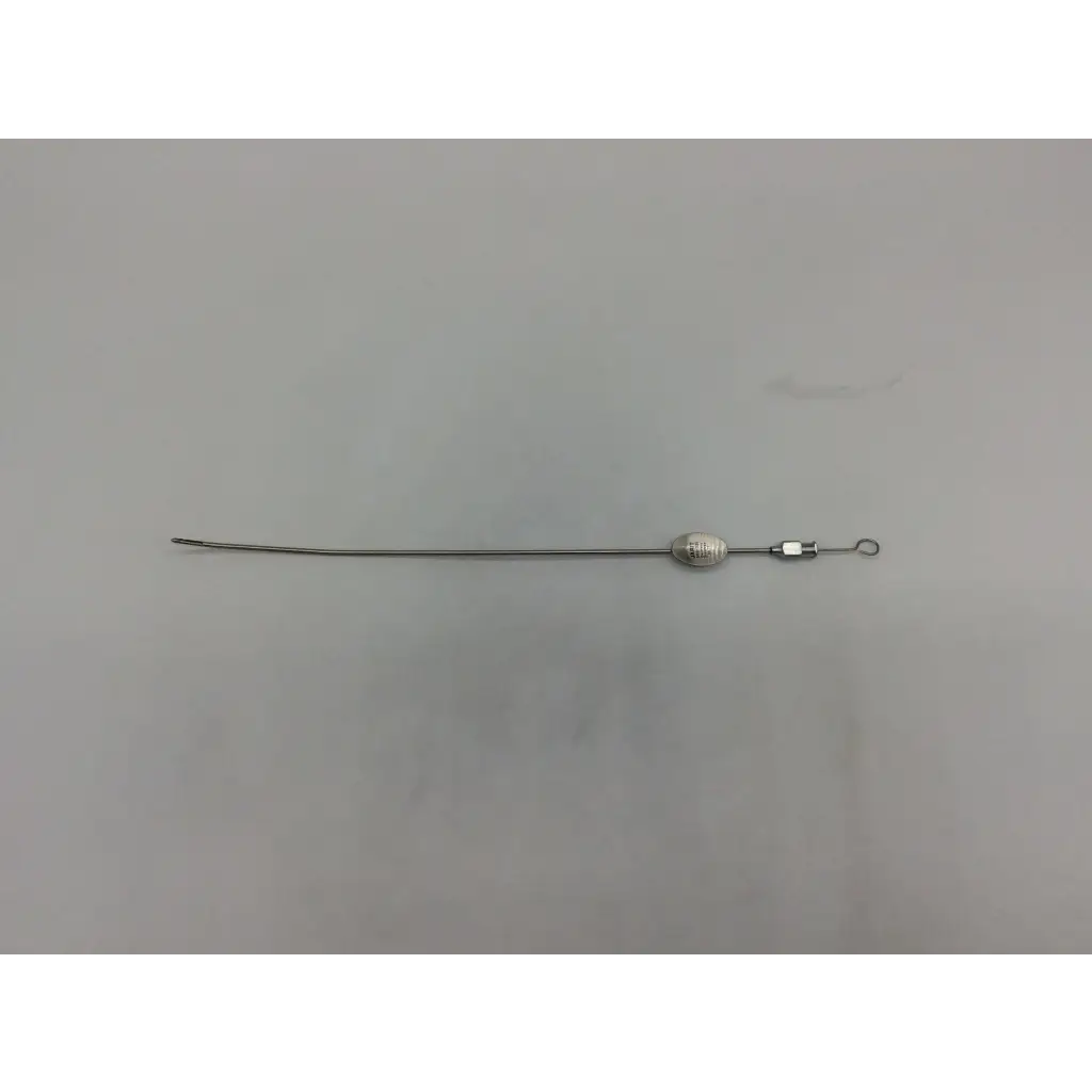 Silver-colored metal jarit surgical novak biopsy suction curette with slender curved shaft and oval handle for surgical use