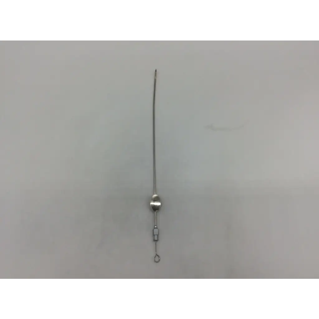 Silver-colored metal jarit surgical novak biopsy suction curette with sleek slender design and small circular bead near top