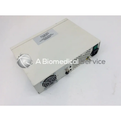 Beige rectangular jedmed globalmed xe30 ntsc light source with silver logo and ventilation grilles on the side