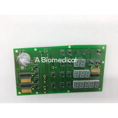 Green rectangular jouan 85232554b thermo cl31 centrifuge control board with digital displays and silver sensor on left side