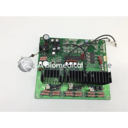 Green jrc ta-0038 pc-0662b circuit board with black heat sinks capacitors and wiring for electronic use