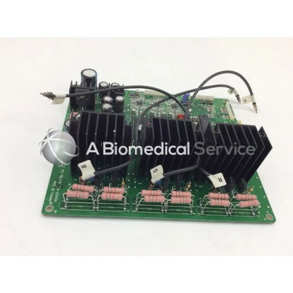 Green jrc ta-0038 pc-0662b board with black heat sinks pink resistors and various electronic components