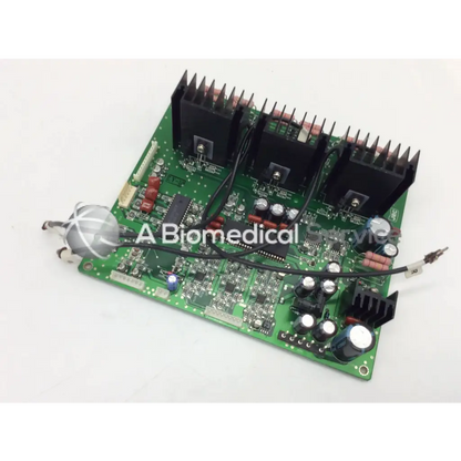 Green jrc ta-0038 pc-0662b printed circuit board with black heat sinks capacitors and electronic components