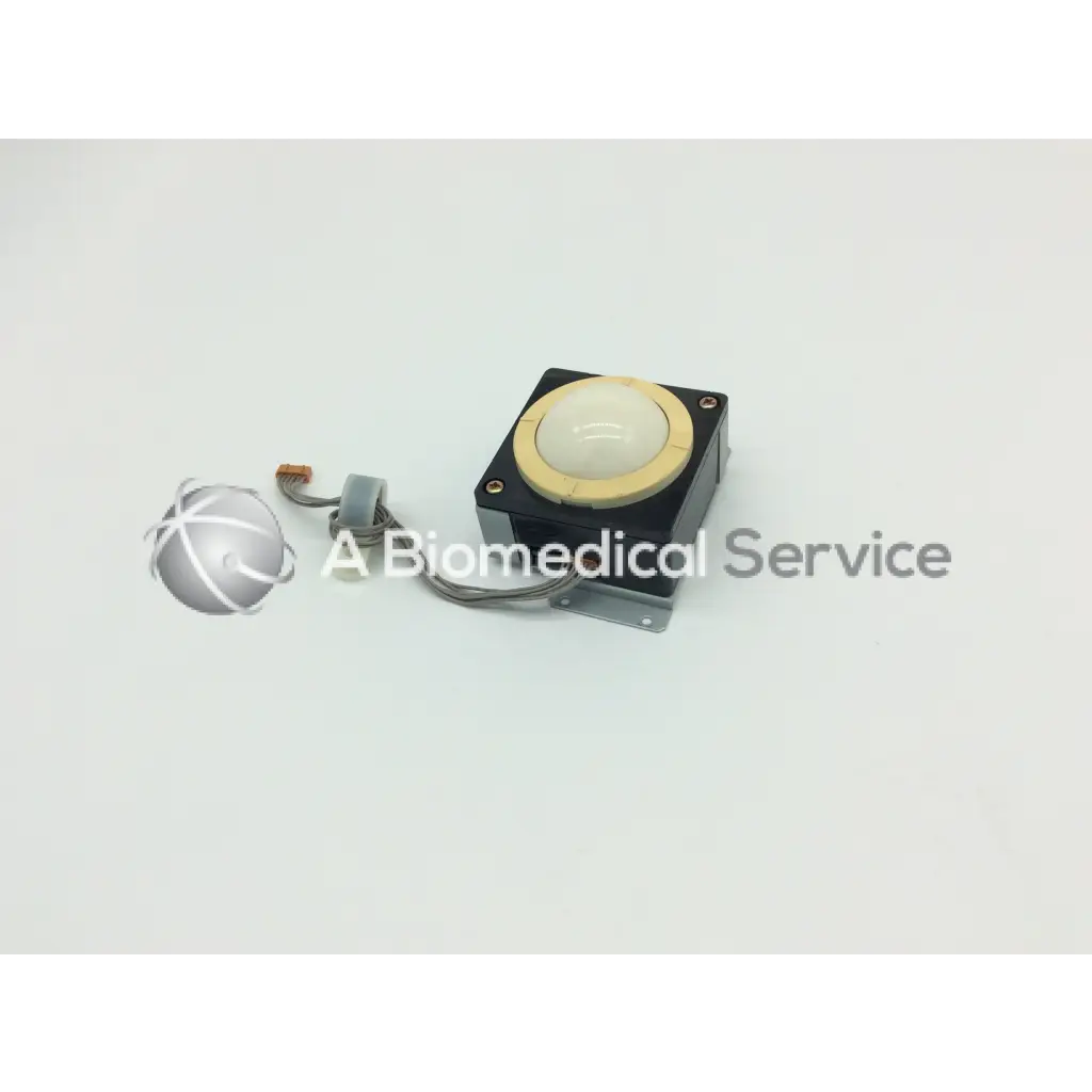 Black rectangular kogyo track ball TRE-201 by kanda tsushin kogyo with beige circular button and attached wires