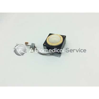 Black rectangular kogyo track ball TRE-201 by kanda tsushin kogyo with beige circular button and attached wires