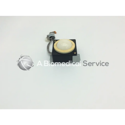 Black rectangular housing with cream domed button and beige surround on kanda tsushin kogyo track ball tre-201