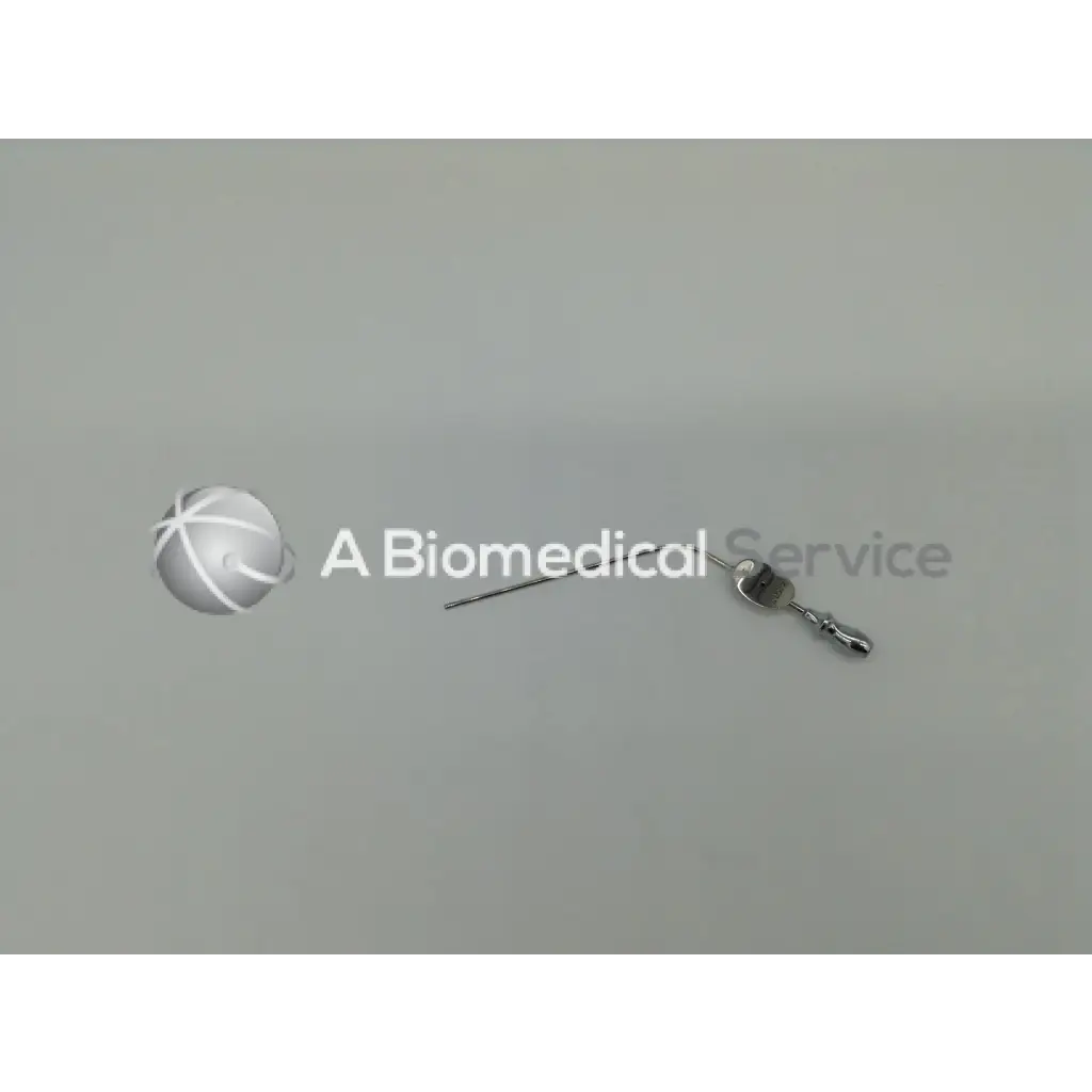 A metallic karl storz suction tip 10 fr medical syringe with a clear barrel and silver-colored needle for precise suction