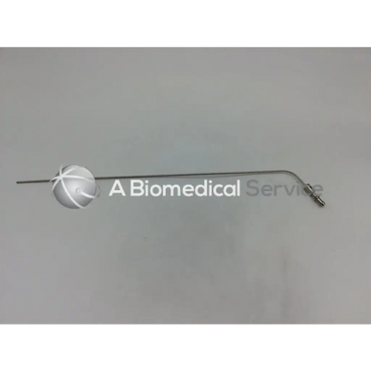 Silver rigid suction tube with curved metal shaft white spherical tip and threaded connector by karl storz